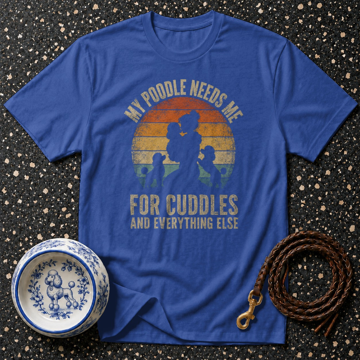 Blue t-shirt with "My Poodle Needs Me For Cuddles And Everything Else" text and poodle silhouette.