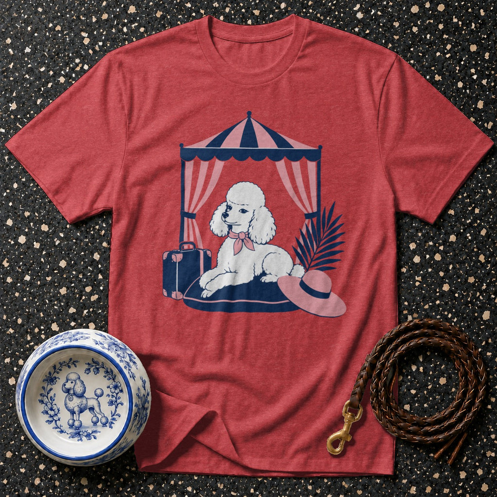 Red t-shirt with a poodle wearing a bow under a striped canopy.