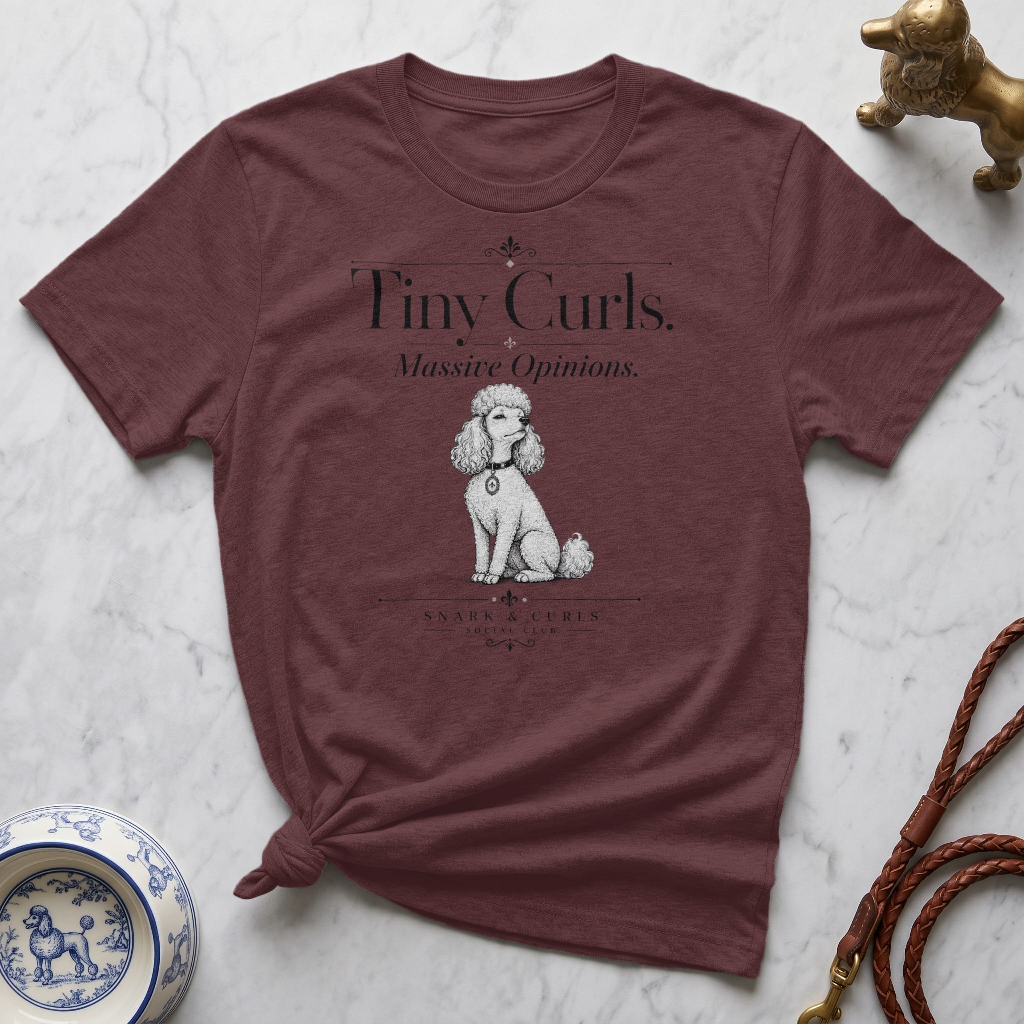 Burgundy t-shirt with "Tiny Curls. Massive Opinions." and poodle graphic.