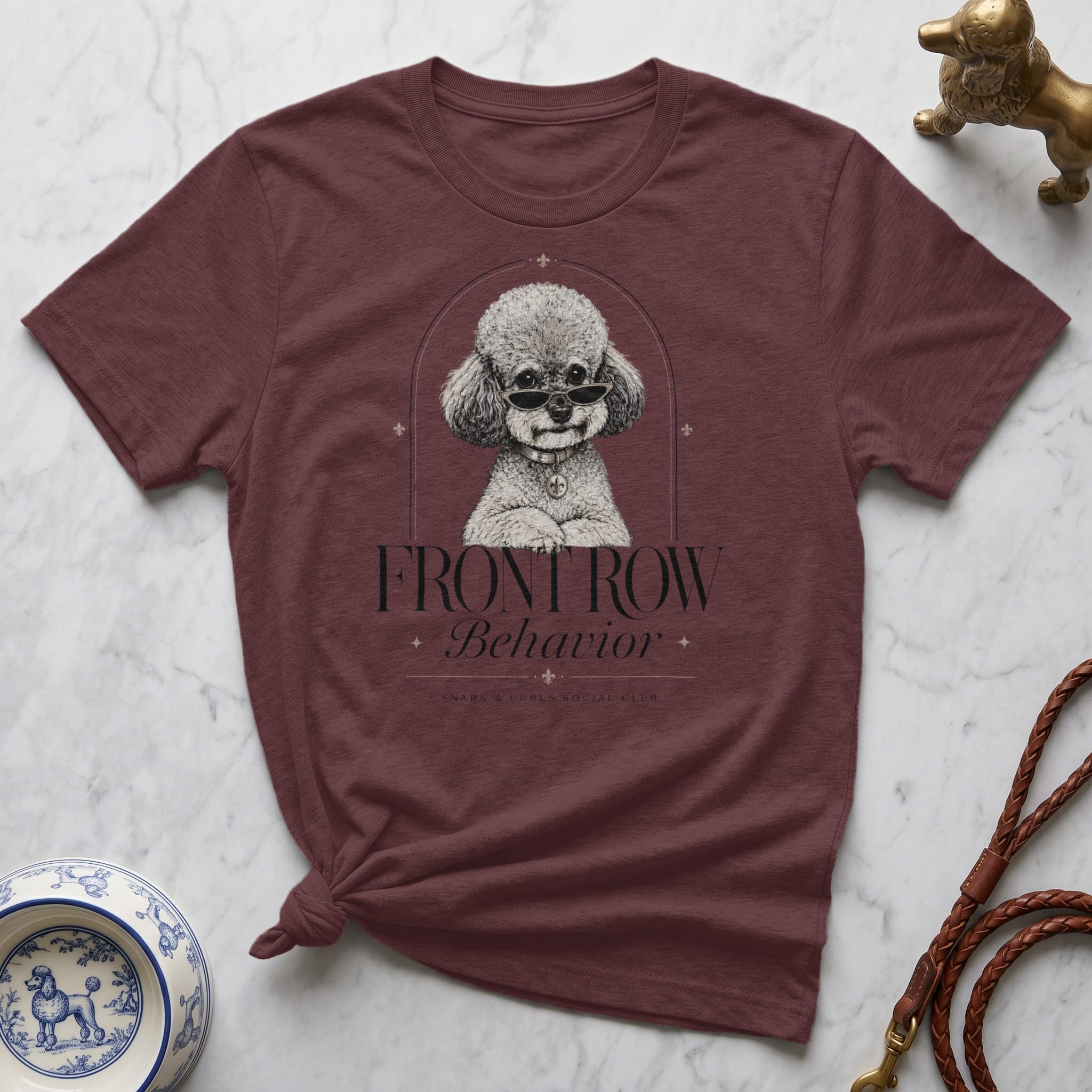 Maroon t-shirt with sunglasses-wearing poodle graphic and "FRONT ROW BEHAVIOR" text.