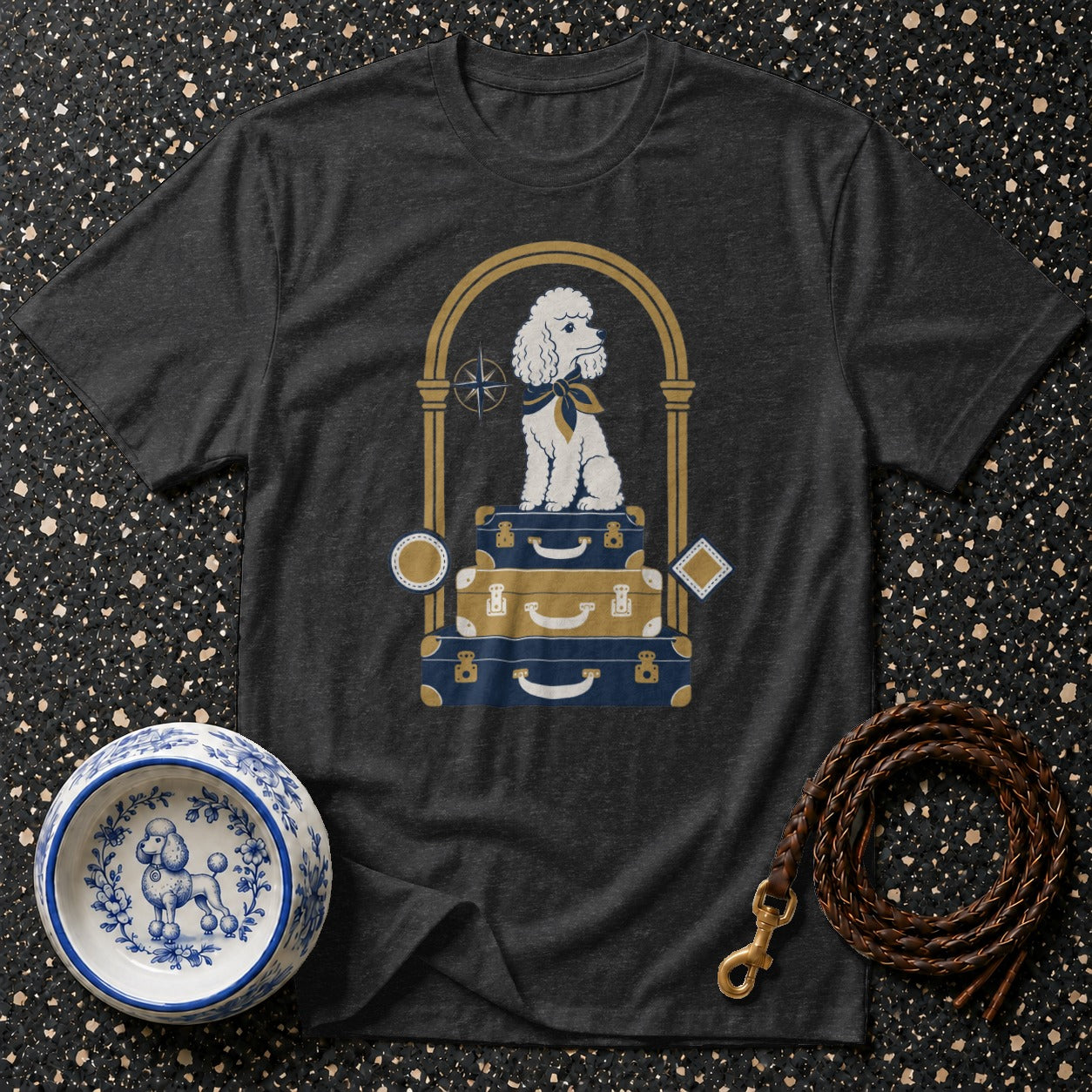 Dark grey t-shirt with a white poodle on stacked luggage.