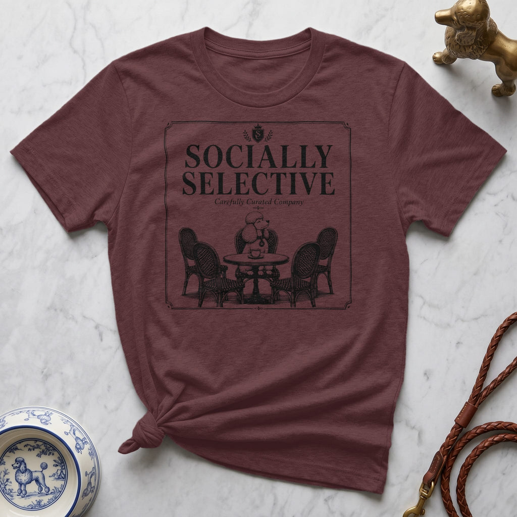 Maroon t-shirt with "Socially Selective" text and a drawing of chairs around a table.