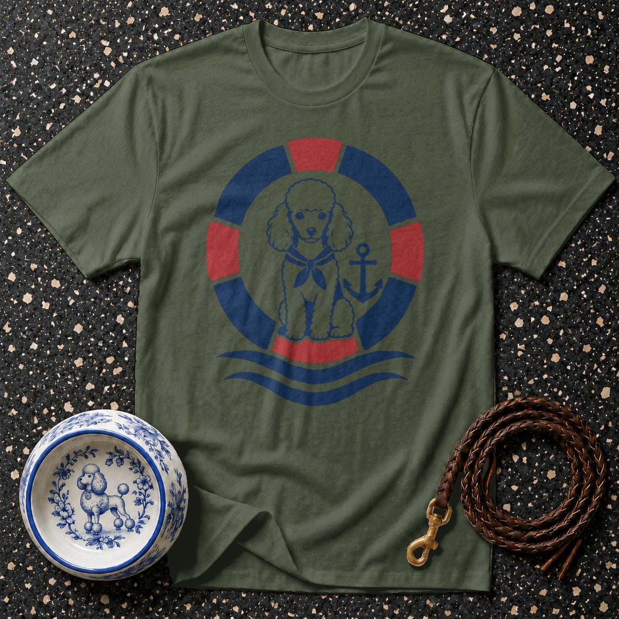 Green t-shirt with a navy and red poodle graphic wearing a sailor scarf and anchor.