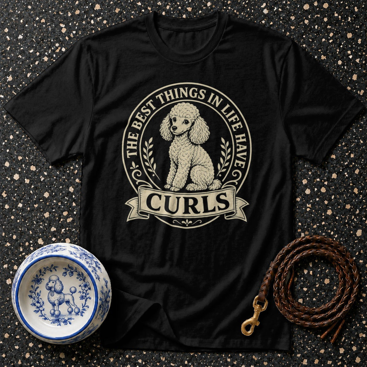 Black t-shirt with poodle graphic and text "THE BEST THINGS IN LIFE HAVE CURLS."