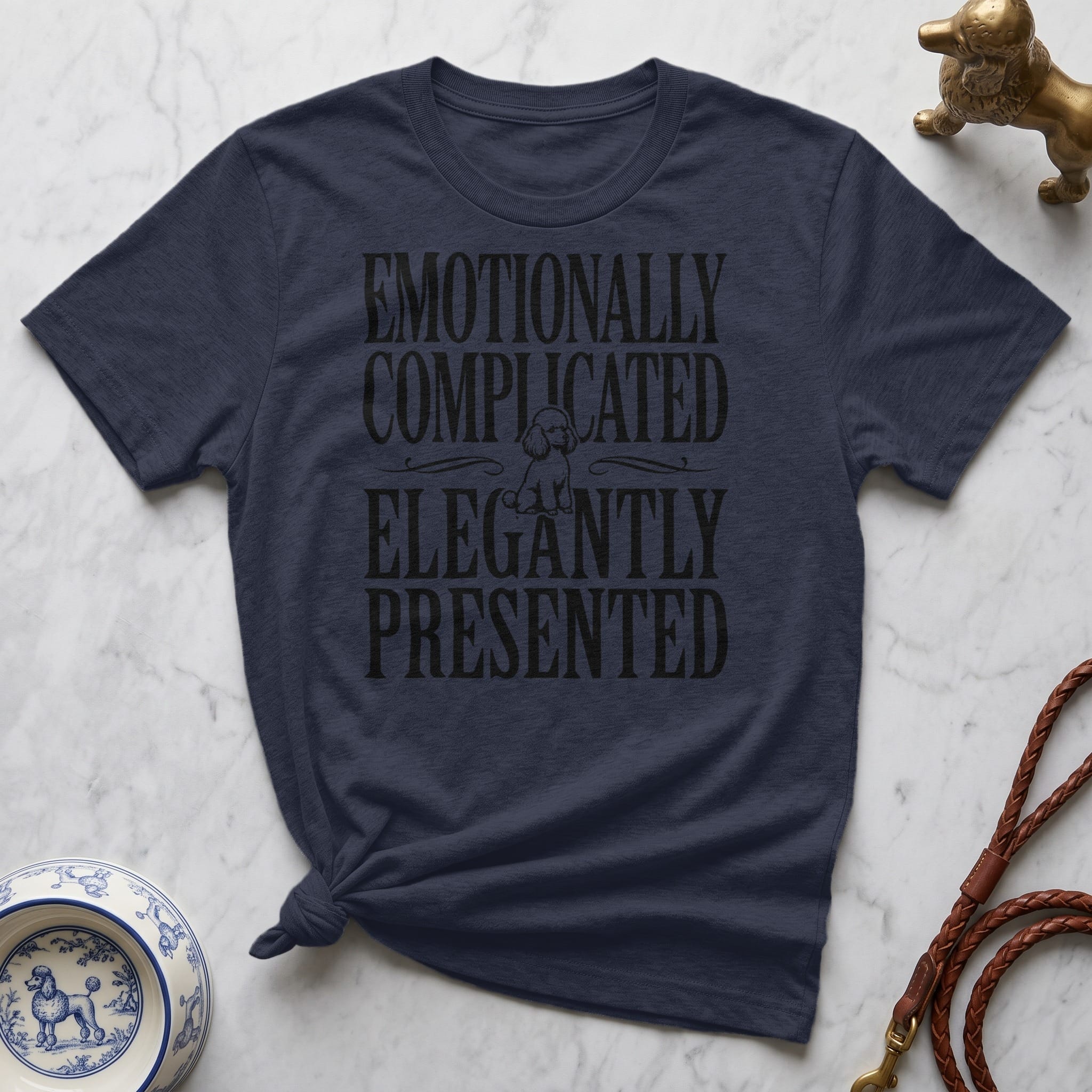 Dark t-shirt with "Emotionally Complicated Elegantly Presented" text.