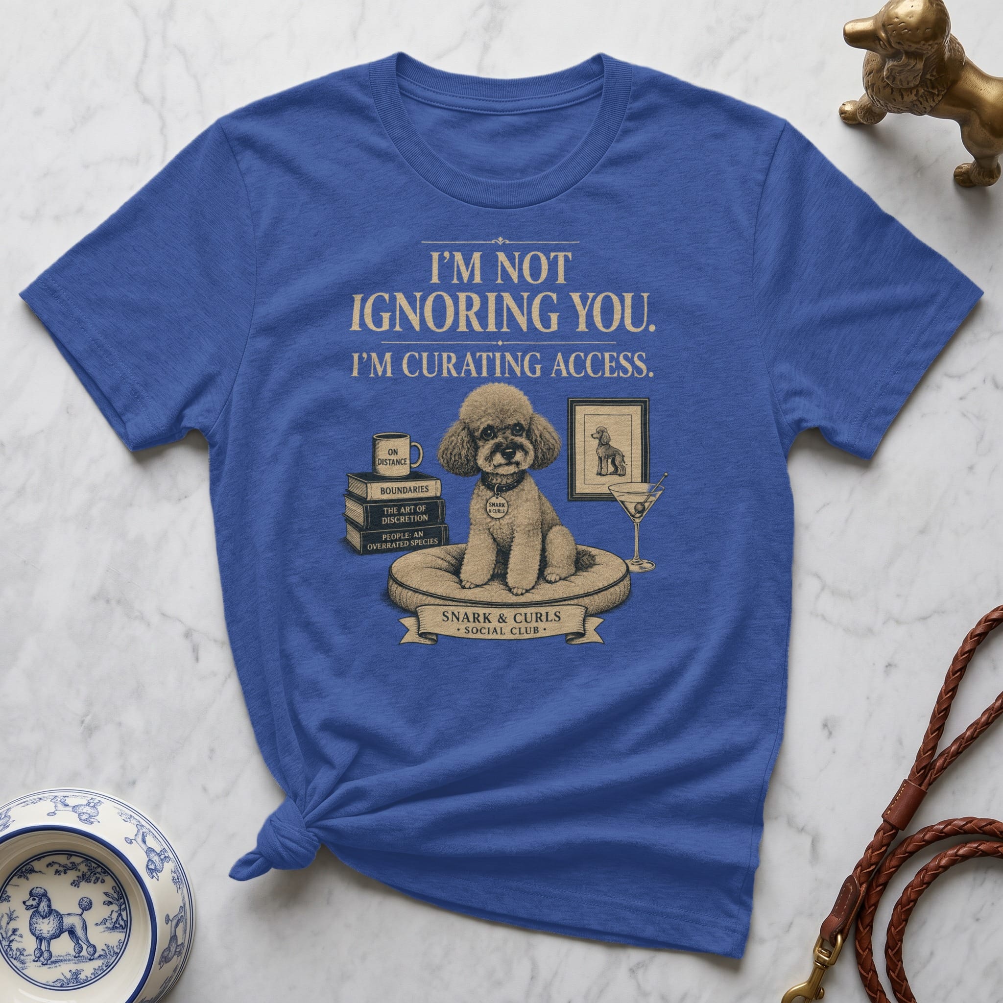 T-shirt with a poodle on a pillow and text "I'm not ignoring you. I'm curating access."