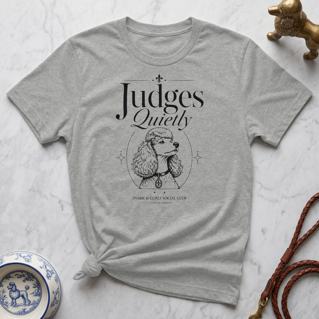 Grey t-shirt with "Judges Quietly" and poodle illustration.