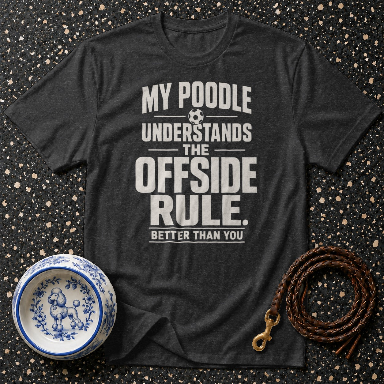 Dark gray t-shirt with "My poodle understands the offside rule better than you" text and soccer ball.