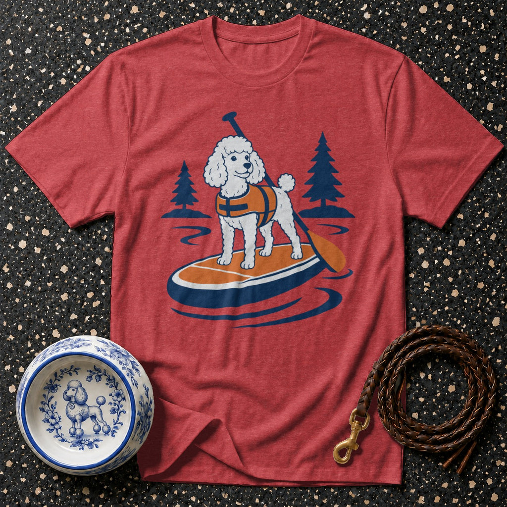 Red t-shirt with a white poodle on a paddleboard in water and trees.