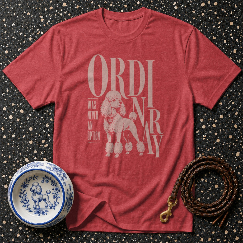 Red t-shirt with poodle graphic and text: "ORDINARY WAS NEVER AN OPTION".
