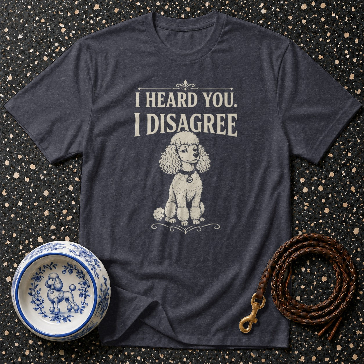 Dark t-shirt with "I heard you. I disagree." and poodle graphic.