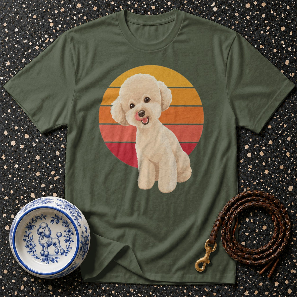 Green t-shirt with a cream poodle design on a striped sunset circle.