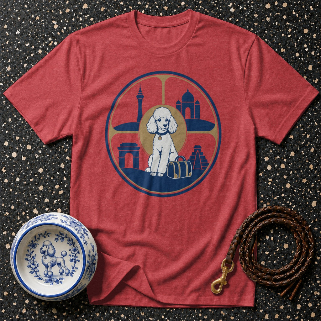 Red t-shirt featuring a poodle with luggage and world landmarks in a circular design.
