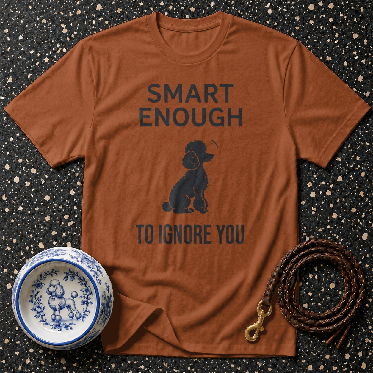 Brown t-shirt with black text "SMART ENOUGH TO IGNORE YOU" and a poodle graphic.