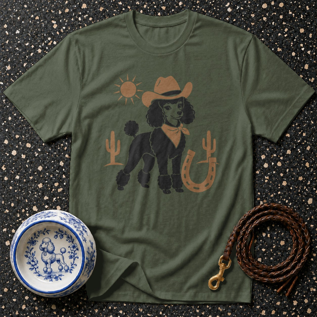 T-shirt with cowboy poodle graphic, sun, cacti, and horseshoe.