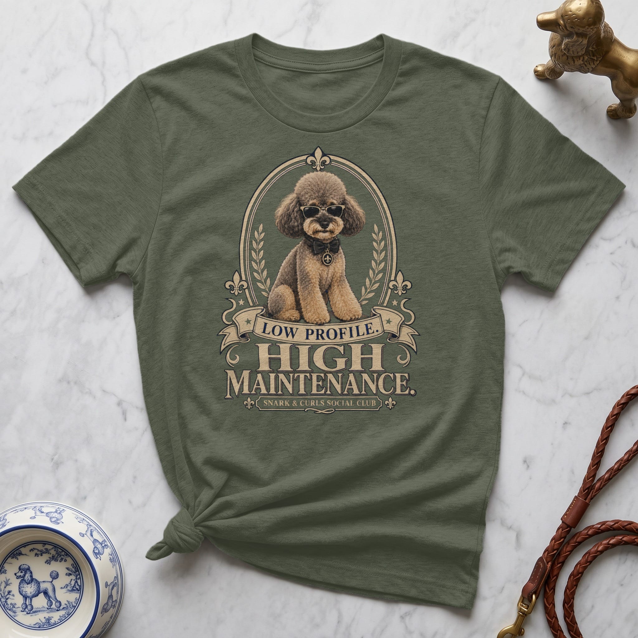 Green t-shirt with "Low Profile. High Maintenance." text and poodle illustration.