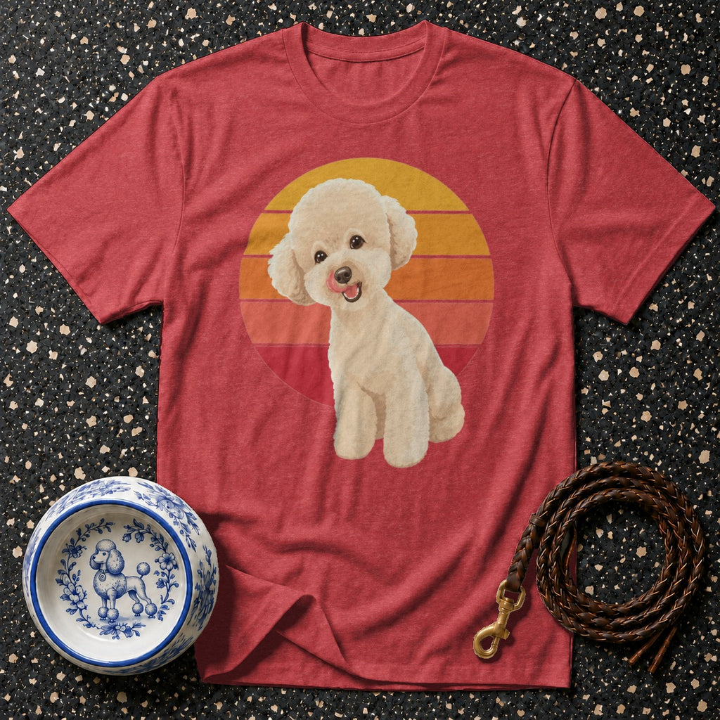 Red t-shirt with a cream poodle graphic against a sunset background.