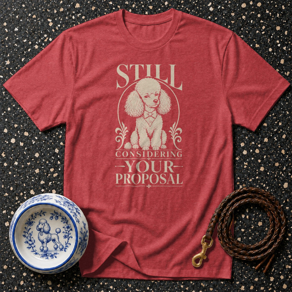 Red t-shirt with poodle graphic and text "Still Considering Your Proposal."