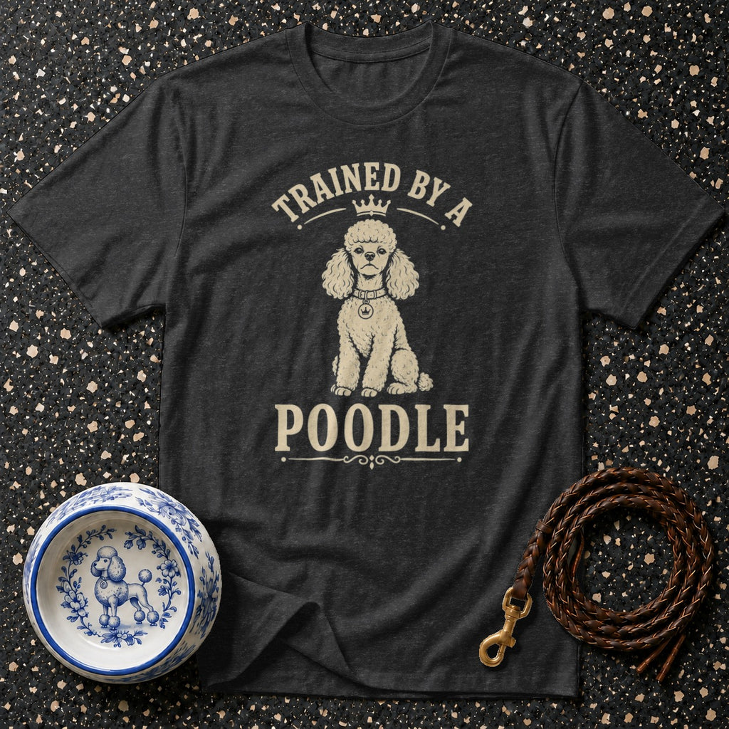 Dark grey t-shirt with "TRAINED BY A POODLE" and a poodle graphic.