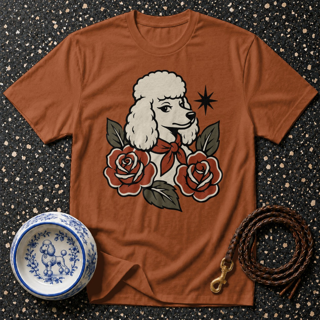Brown t-shirt with poodle and roses graphic, plus dog bowl and leash.