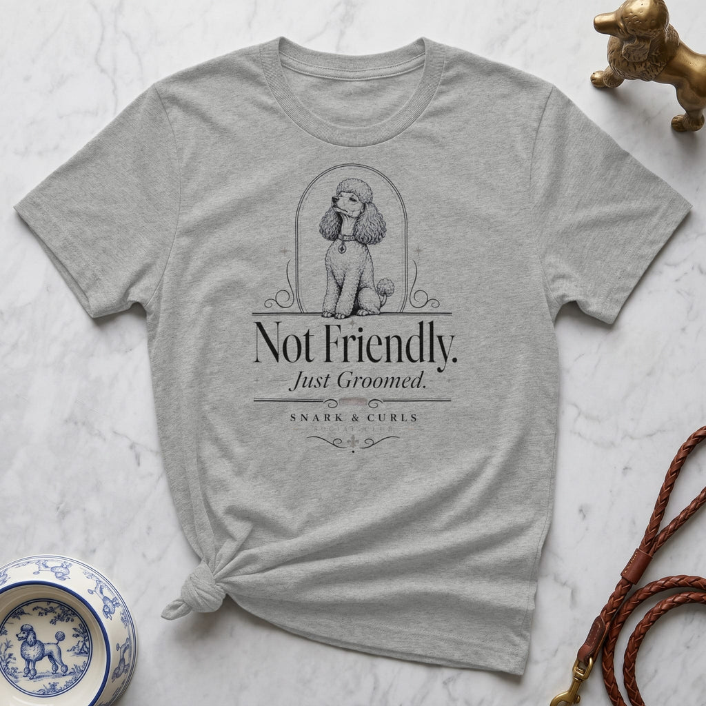 Grey t-shirt with "Not Friendly. Just Groomed." text and poodle graphic.