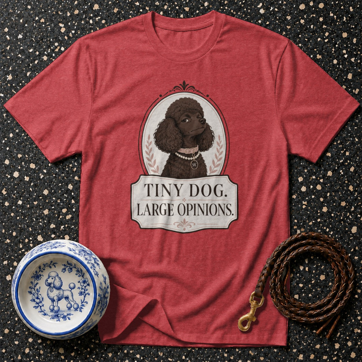 Red t-shirt with poodle graphic and text "Tiny Dog. Large Opinions."