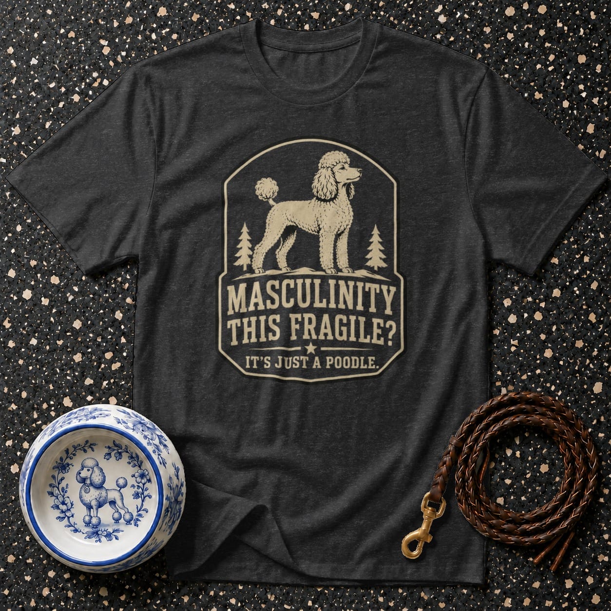 Dark t-shirt with a poodle graphic and the text "MASLINITY THIS FRAGILE? IT'S JUST A POODLE."