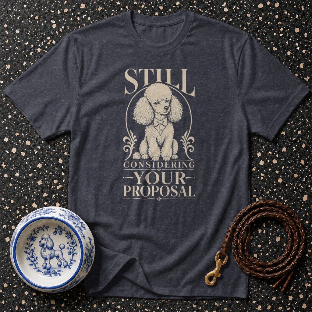 T-shirt with a poodle graphic and text "STILL CONSIDERING YOUR PROPOSAL".