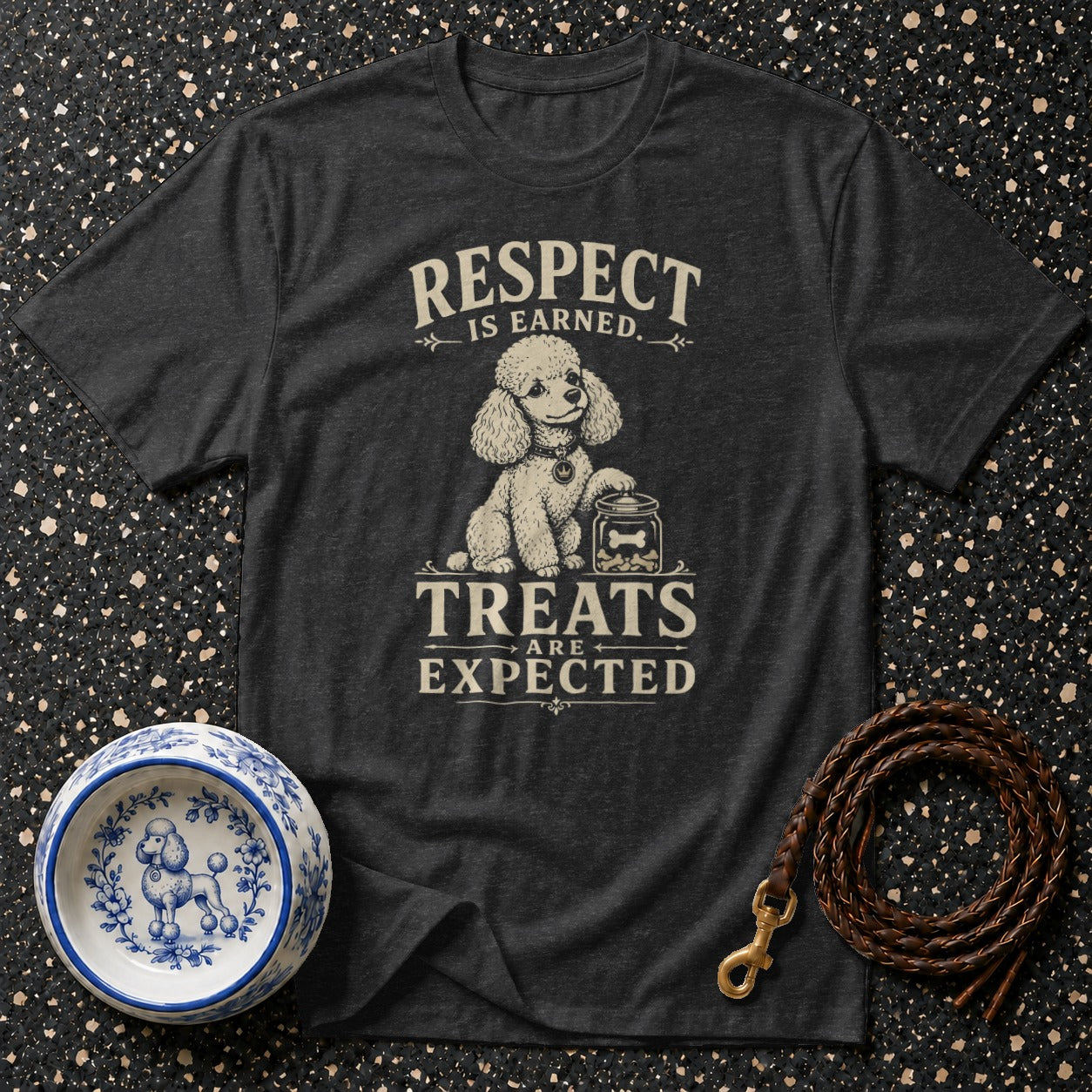 Dark t-shirt with poodle graphic and text "Respect is Earned. Treats Are Expected."