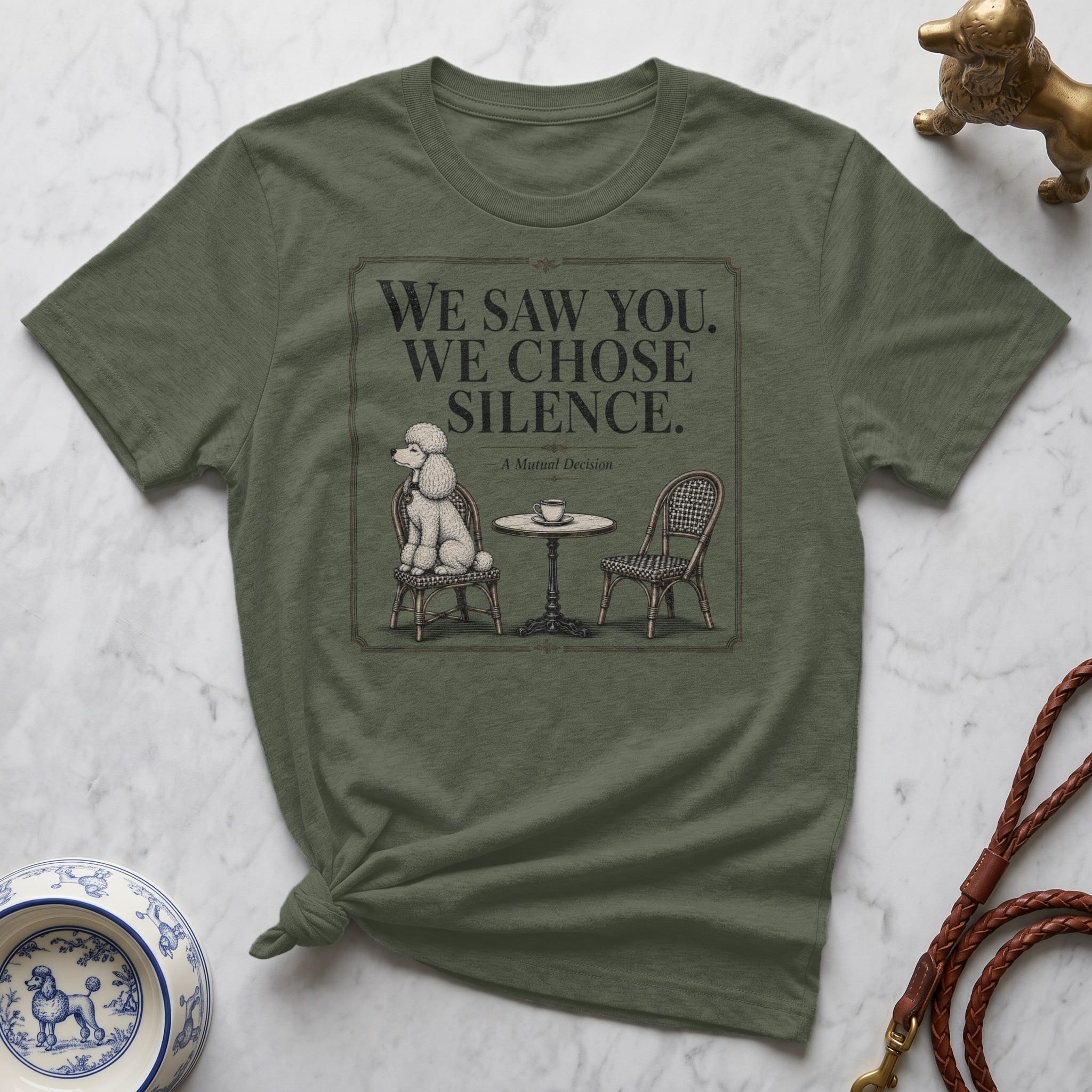 T-shirt with "We Saw You. We Chose. Silence." text and poodle graphic.