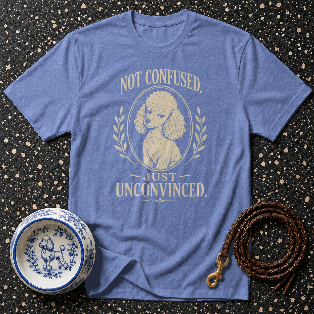 Blue t-shirt with poodle graphic and text "NOT CONFUSED. JUST UNCONVINCED."
