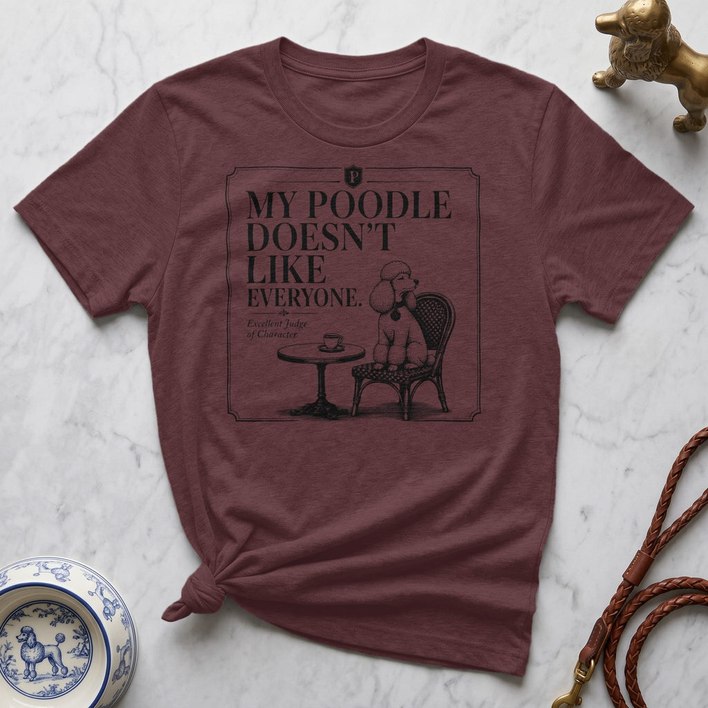 Burgundy t-shirt with a poodle graphic and "My Poodle Doesn't Like Everyone" text.