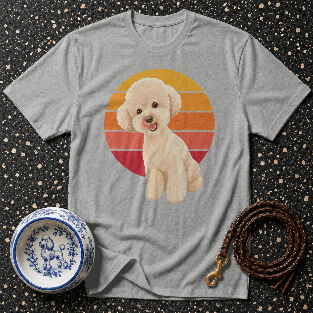Grey t-shirt with a white poodle graphic against a striped sunset circle.