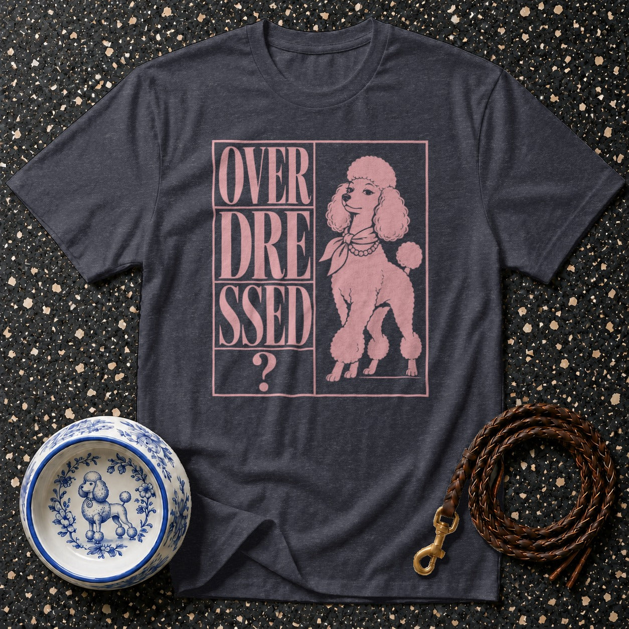 T-shirt with "OVER DRESSED?" text and pink poodle graphic.