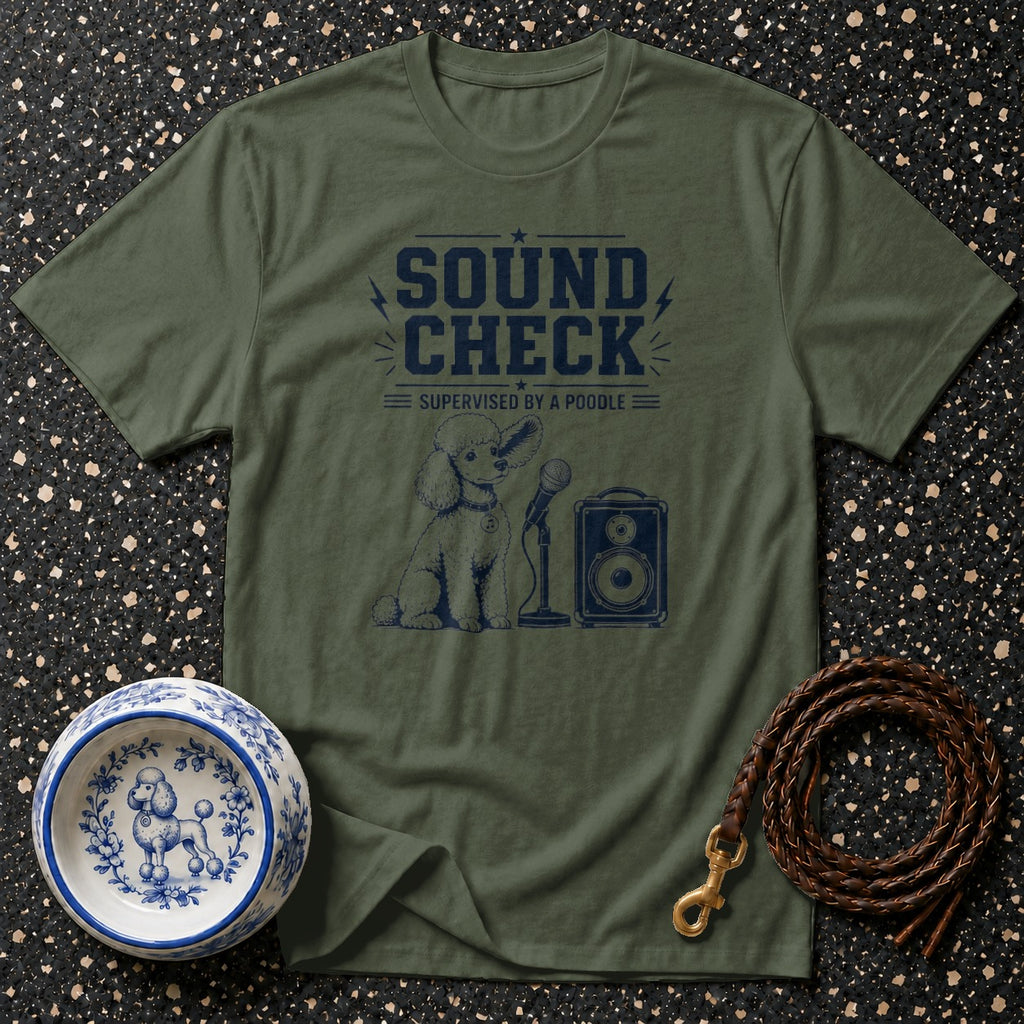 Green t-shirt with navy graphic of a poodle, microphone, and speaker, reading "Sound Check Supervised by a Poodle".