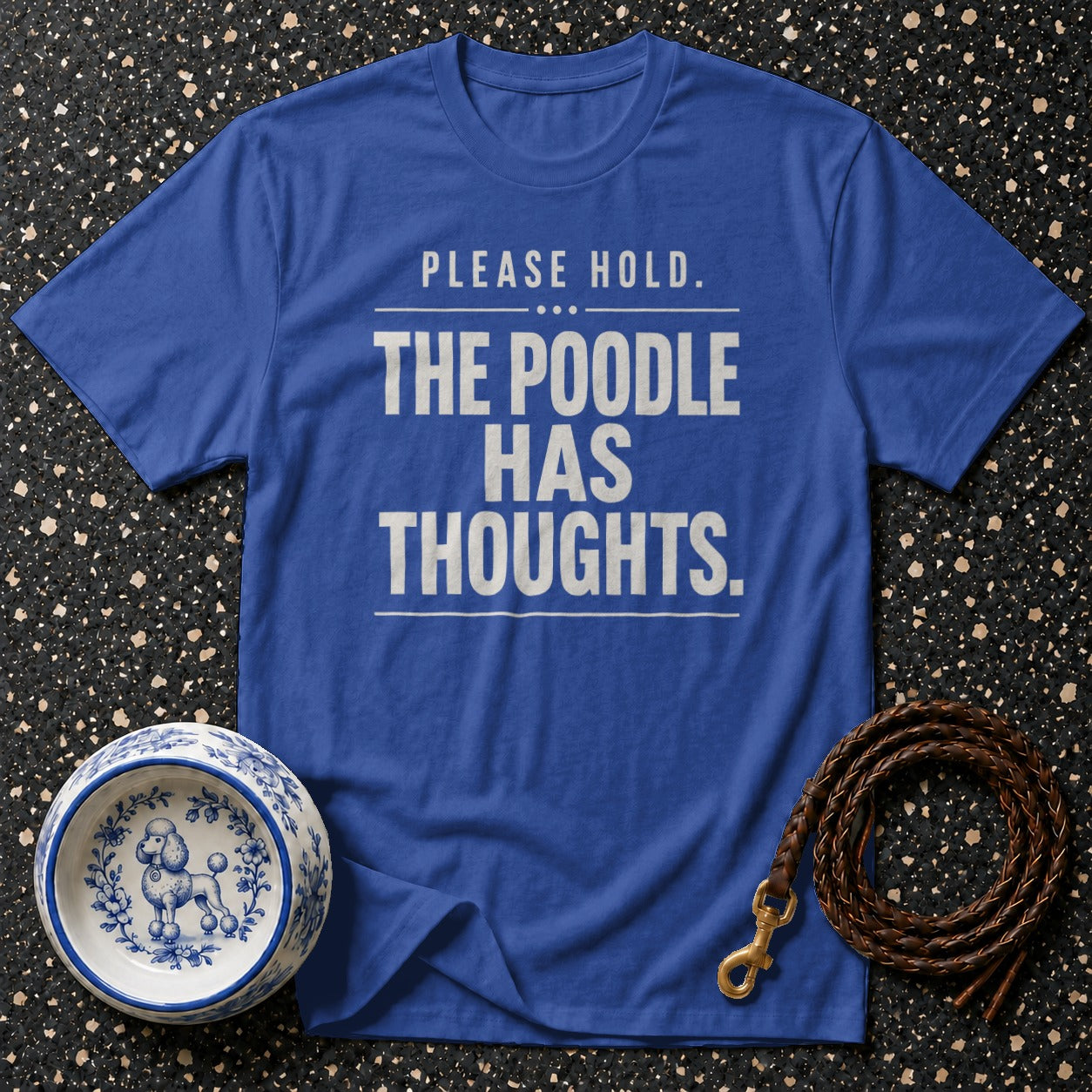 Blue t-shirt with text "Please Hold. The Poodle Has Thoughts."