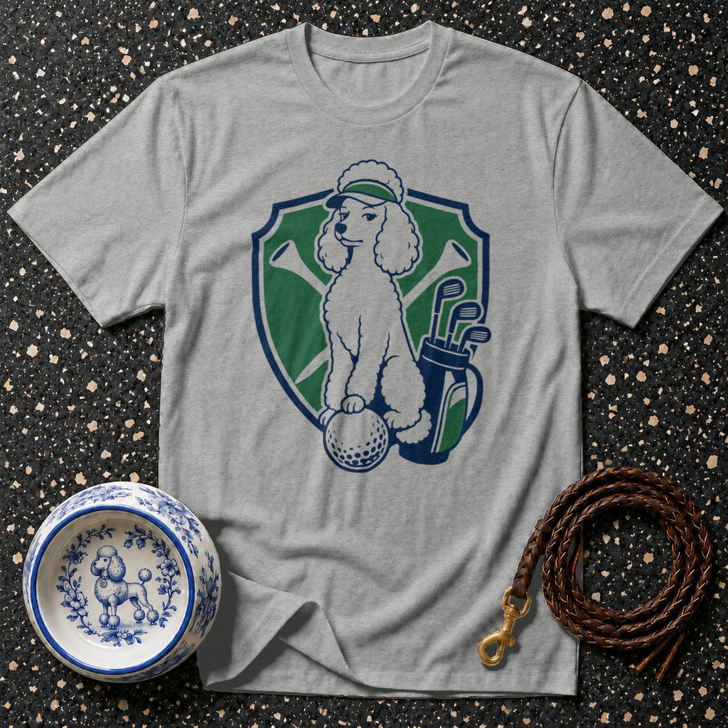 Grey t-shirt with poodle golfer design, golf bag, and golf ball.