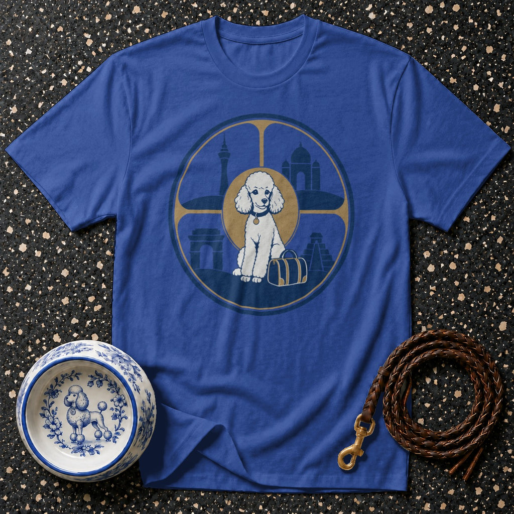 Blue t-shirt with a graphic of a poodle and world landmarks inside a circular frame.