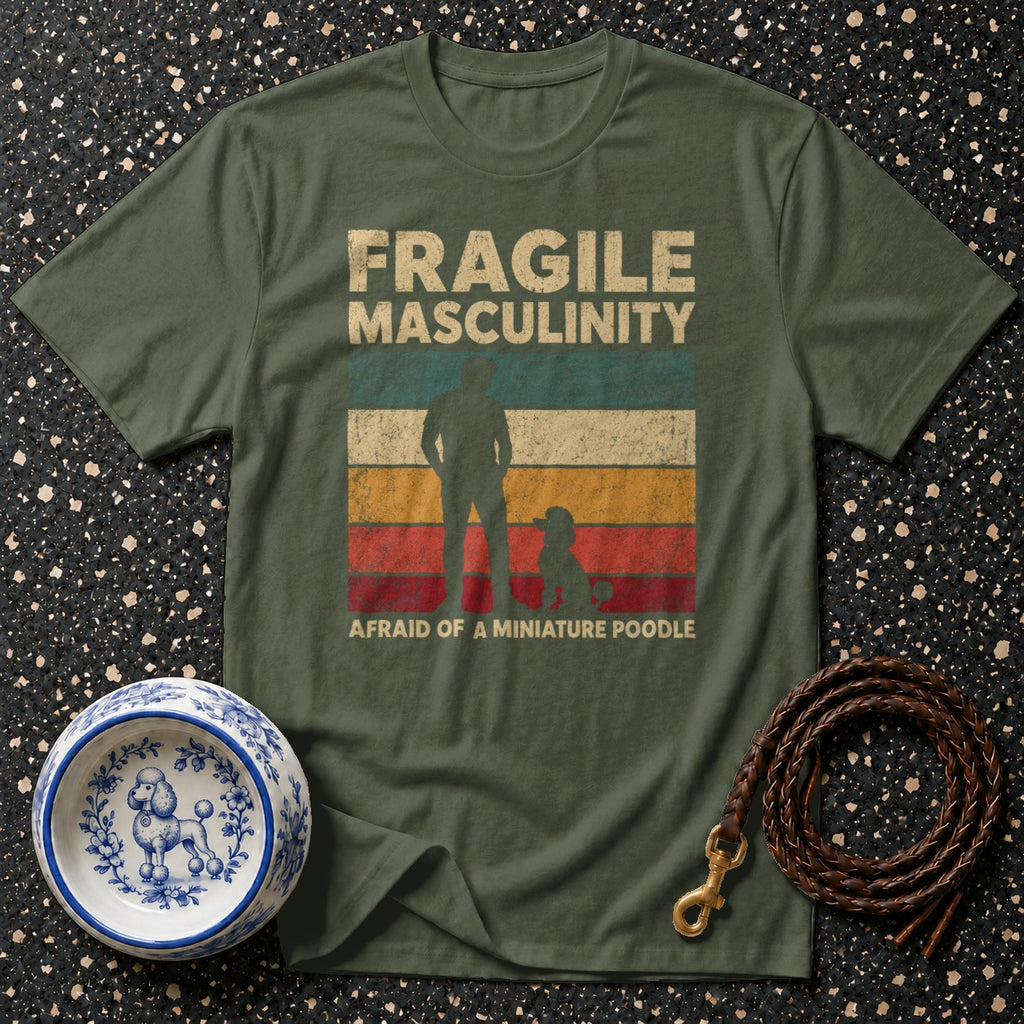 Green t-shirt with "Fragile Masculinity Afraid of a Miniature Poodle" text.