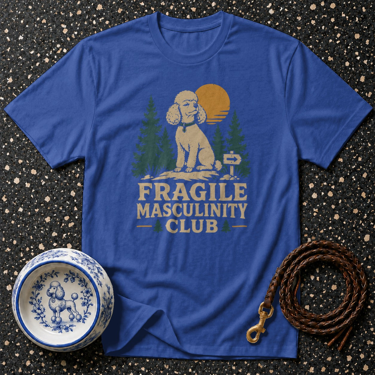 Blue t-shirt with "Fragile Masculinity Club" text featuring a poodle.