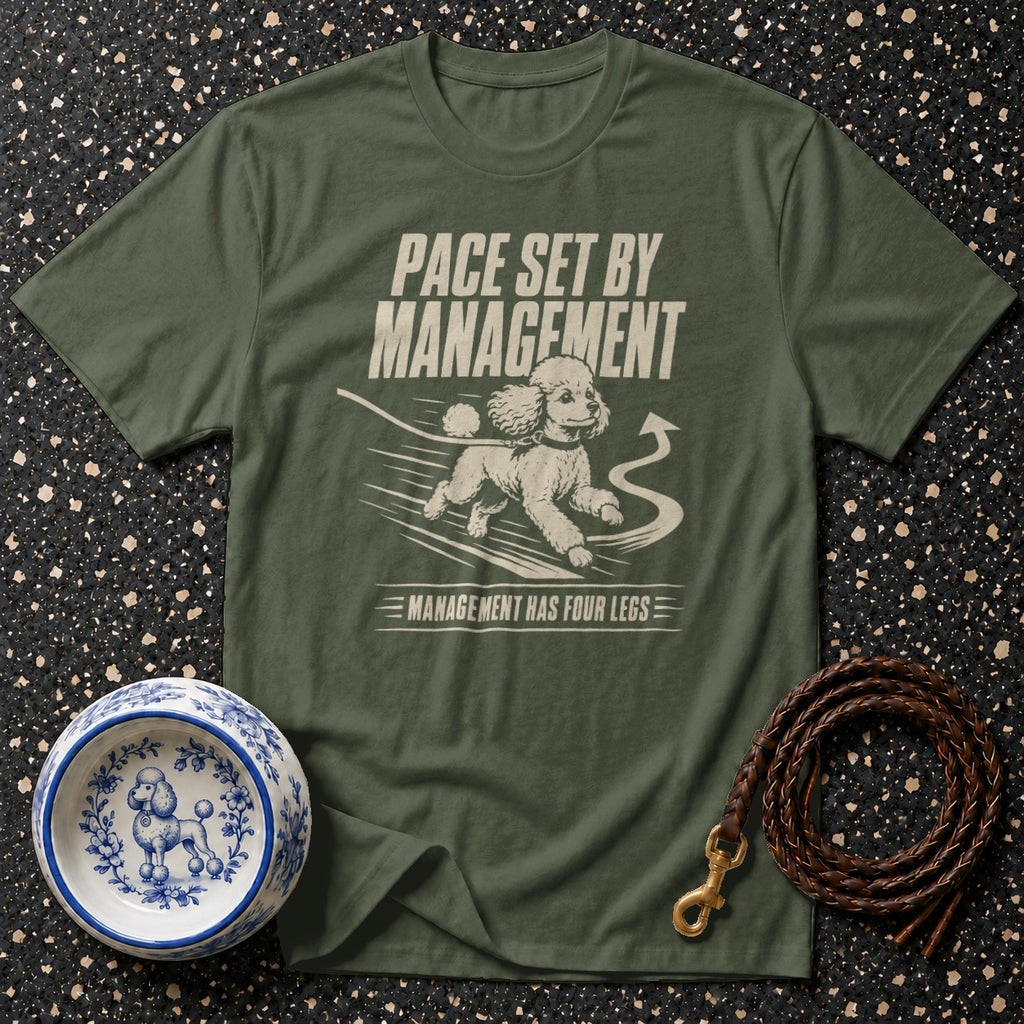 Green t-shirt with poodle graphic and text "Pace Set By Management".
