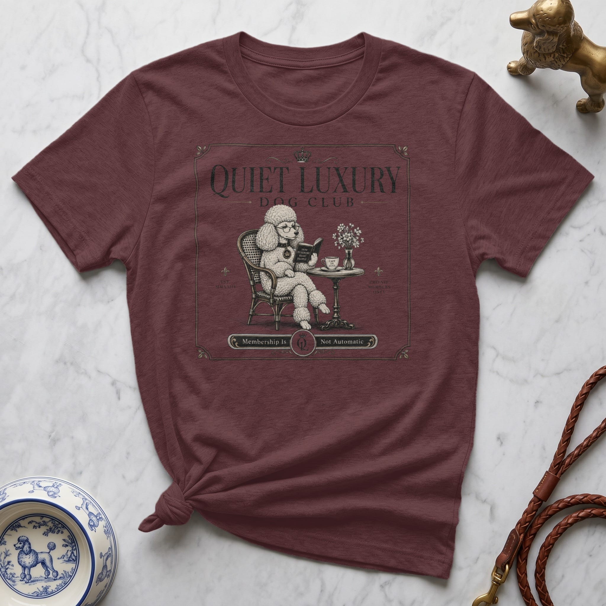 Maroon t-shirt with "Quiet Luxury Dog Club" and a poodle reading a book.