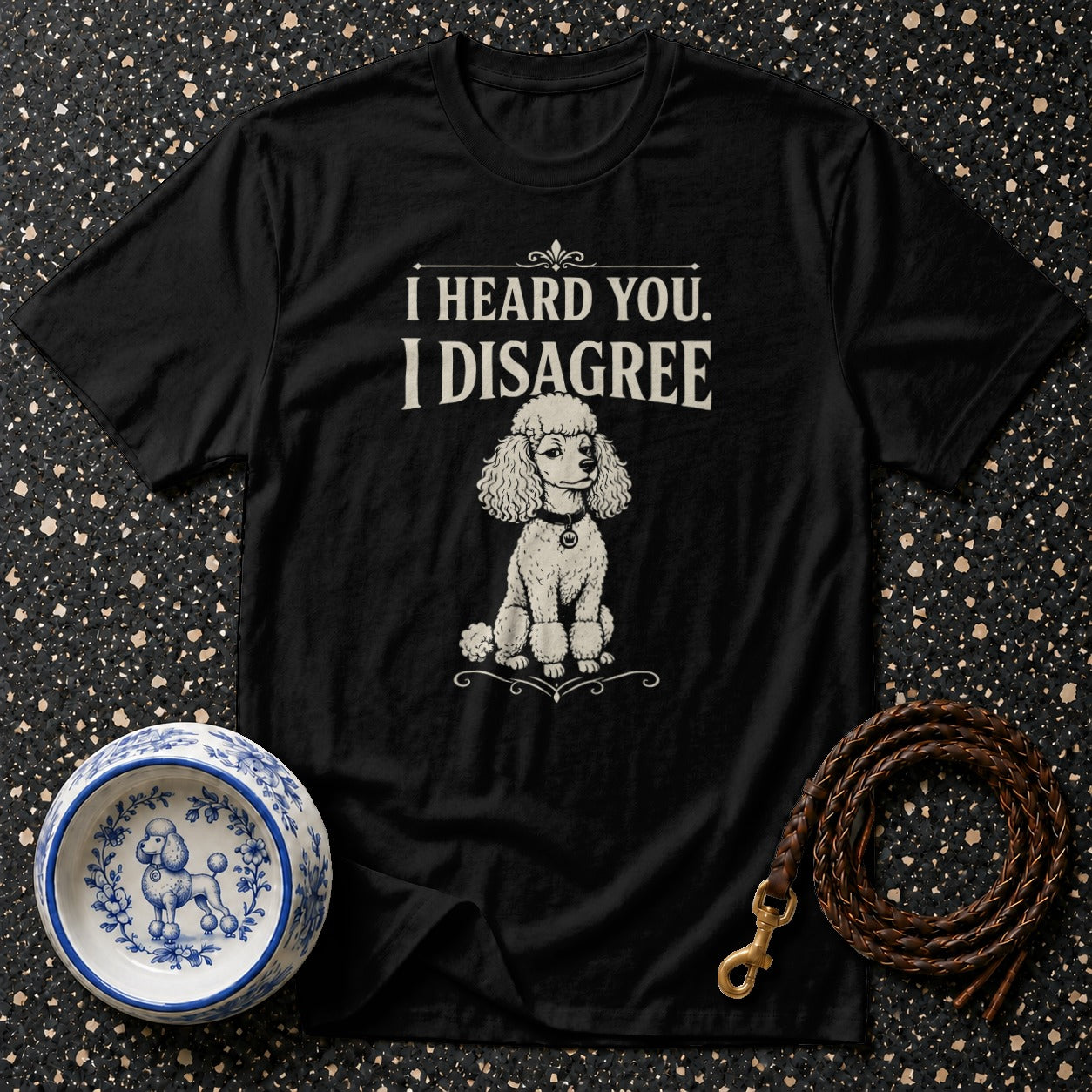 Black t-shirt with white text "I HEARD YOU. I DISAGREE" and a poodle graphic.