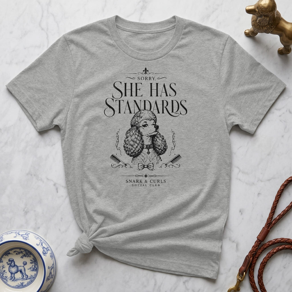 Grey t-shirt with "Sorry She Has Standards" and poodle graphic.