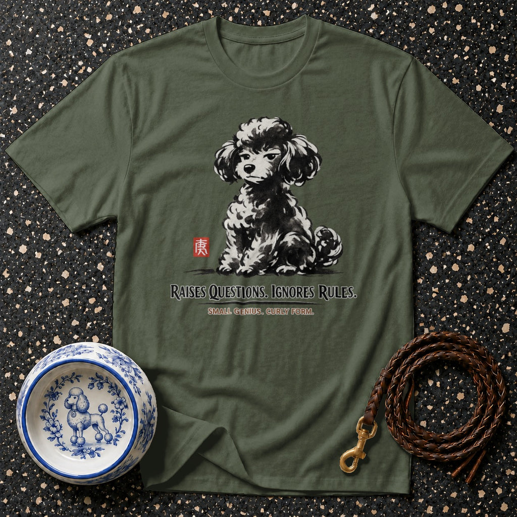 Green t-shirt with black and white poodle graphic, text reads "RAISES QUESTIONS. IGNORES RULES."
