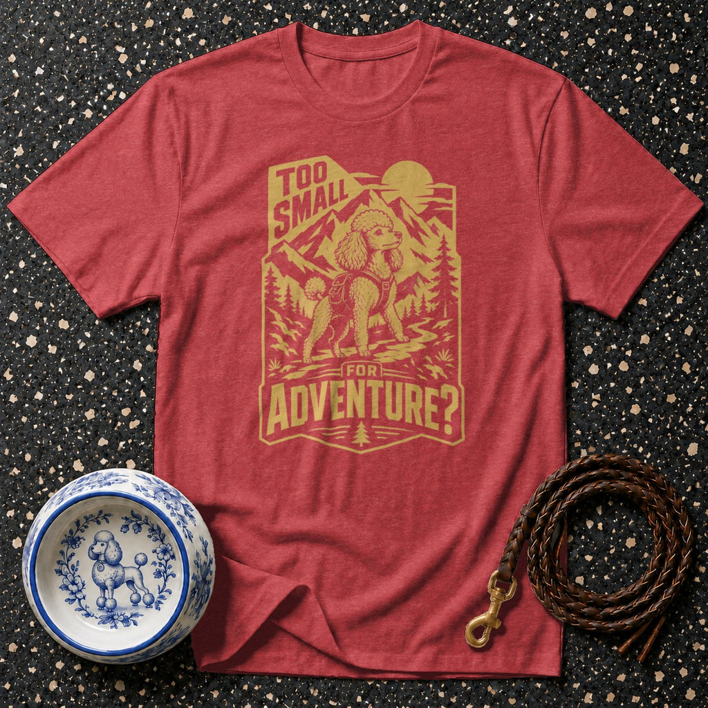 Red t-shirt with graphic of poodle on mountain adventure, text "Too Small For Adventure?"