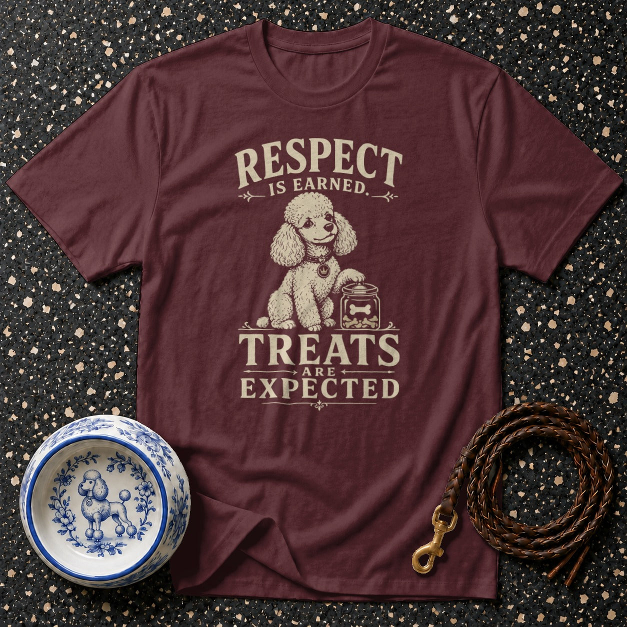 Maroon t-shirt with poodle graphic and "Respect is earned, Treats are expected" text.