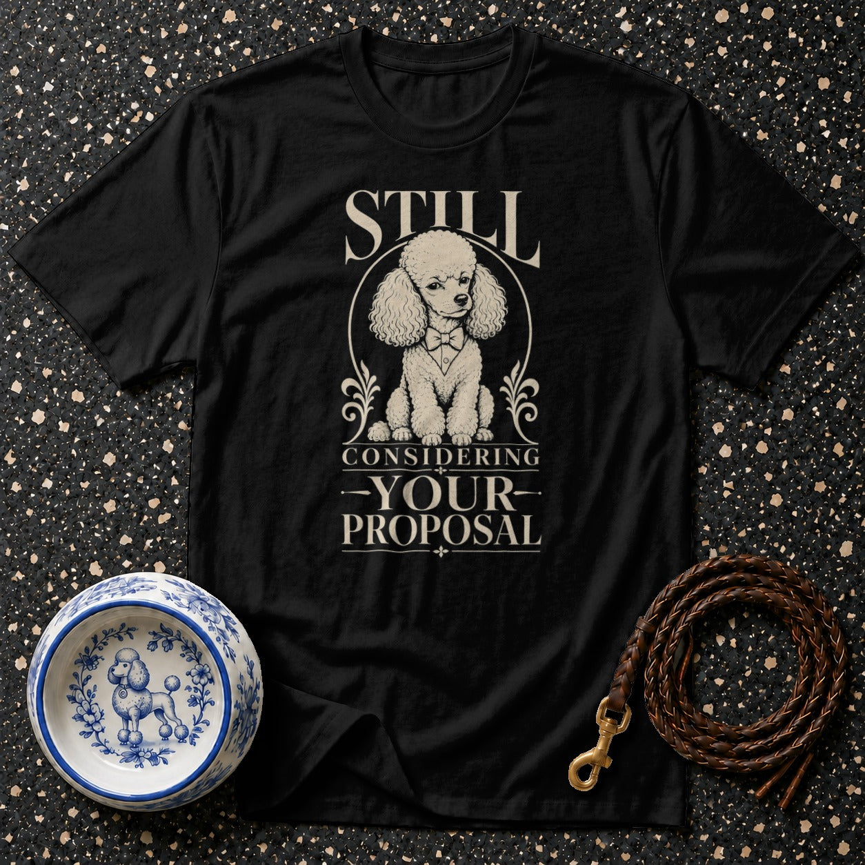 Black t-shirt with poodle graphic and text "STILL CONSIDERING -YOUR- PROPOSAL".