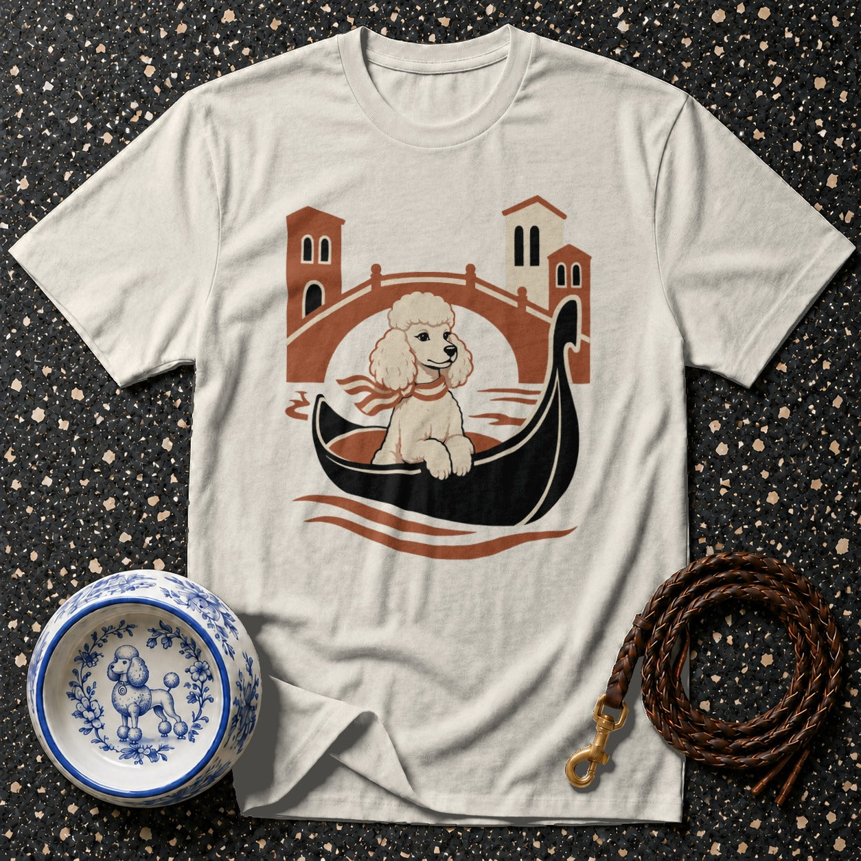 T-shirt with cream poodle in gondola and Venetian bridge graphic.