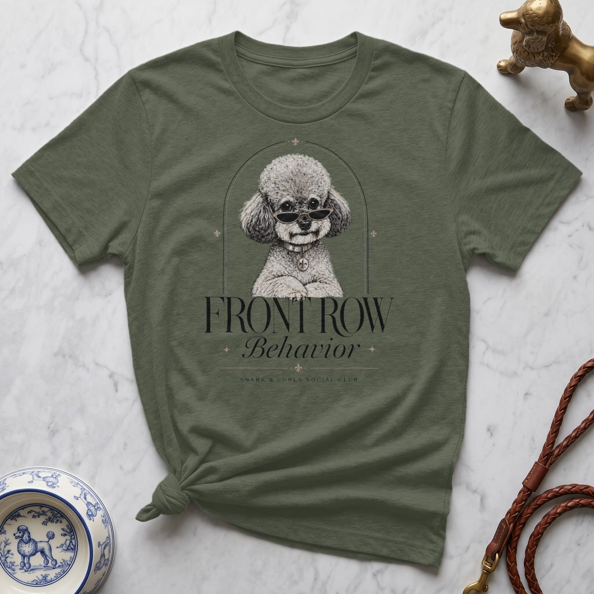 Green t-shirt with poodle wearing sunglasses and "Front Row Behavior" text.